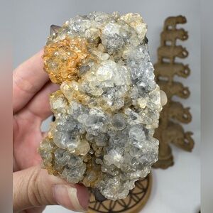 Crystal Cluster uv reactive with fluorite with Orange and Gray Hues